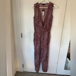 Dynamite Swirl Patterned Jumpsuit in Red and White